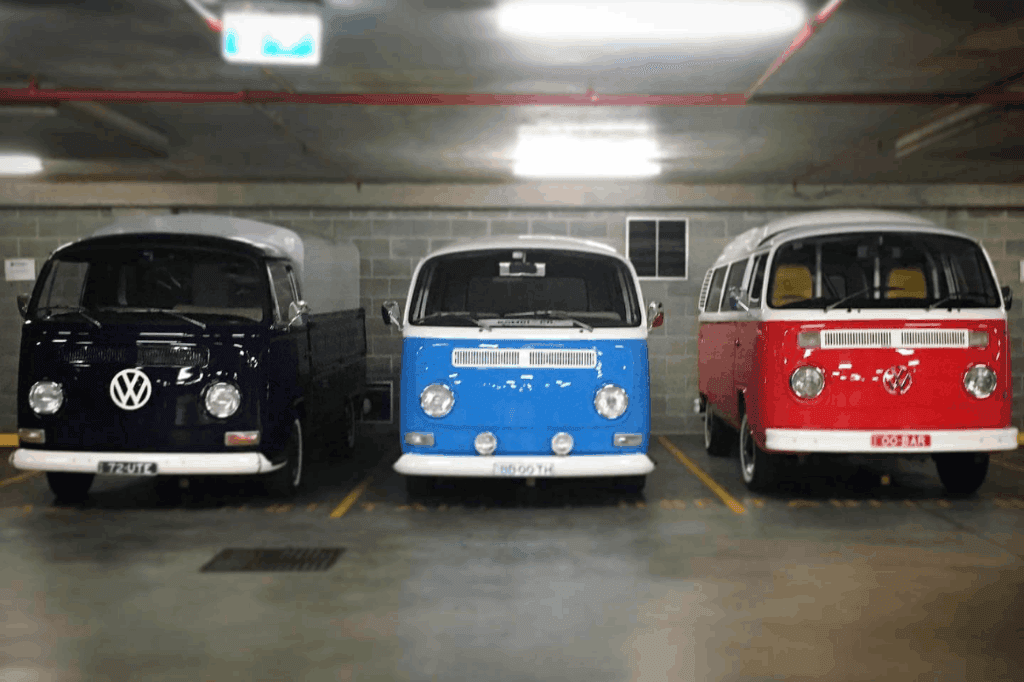 Three Kombi transformed into a mobile bar of Kombi & Co's parked side by side with each other.