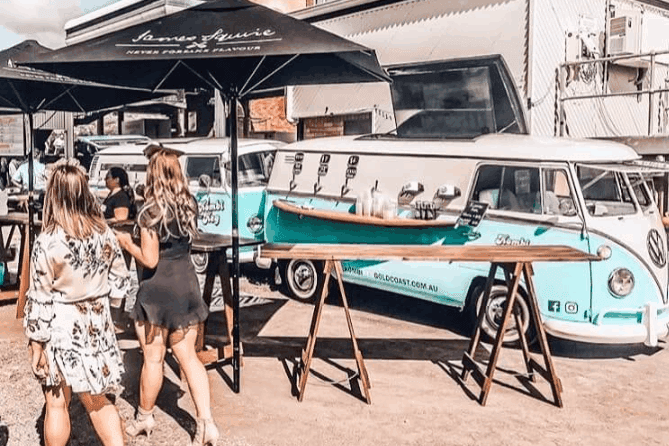 Two of Kombi Keg Gold Coast's mobile bars catering an event.