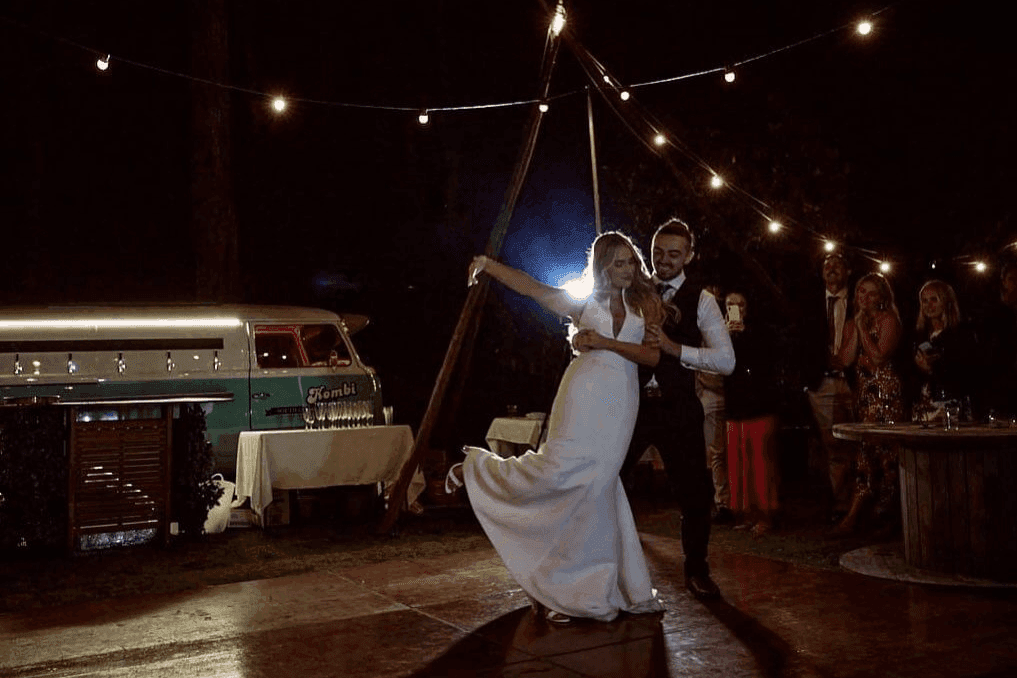 Newly wed couple dancing in an event catered by the Kombi Keg South Coast's mobile bar.