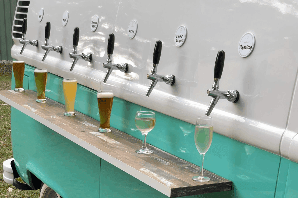 Beverage taps of Kombi Keg Sunshine Coast mobile bar loaded with variety of drinks in an event.