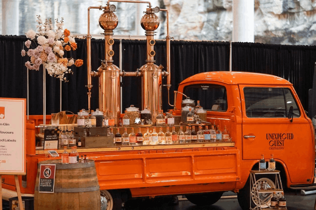 The mobile bar of Unexpected Guest equipped with all the tools and drinks catering an event.