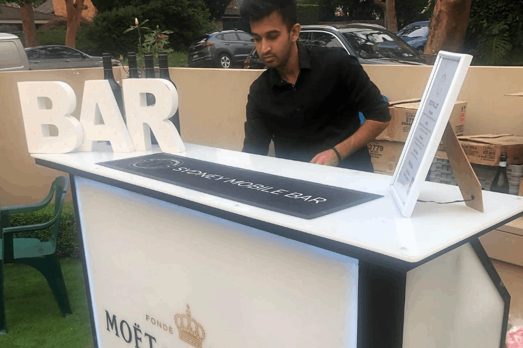 Sydney Mobile Bar's mobile bar counter serving in an event.
